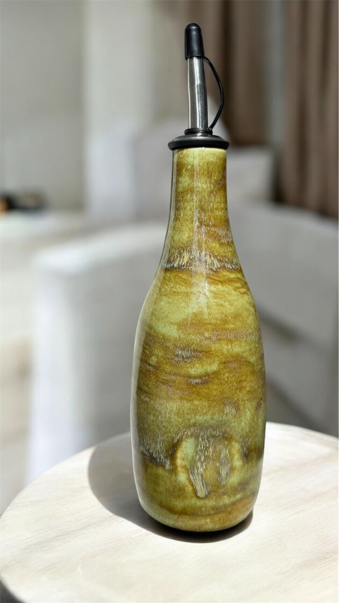 Thumb olive oil bottle